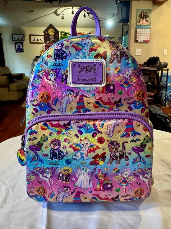Loungefly Handbags - RARE Lisa Frank Halloween Loungefly